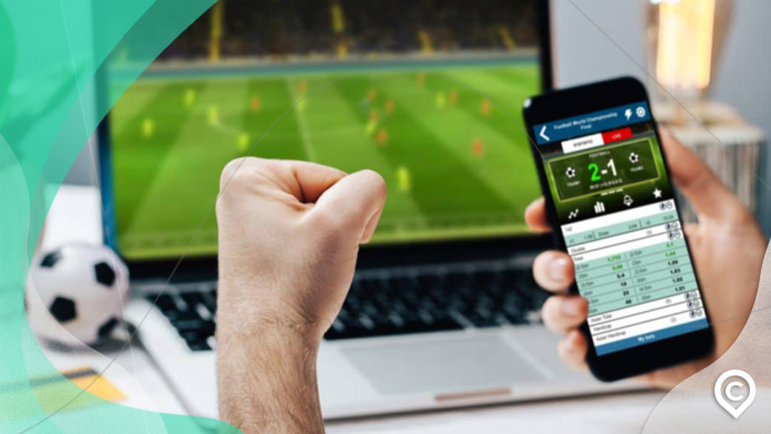 homem ganhando dinheiro com apostas esportivas